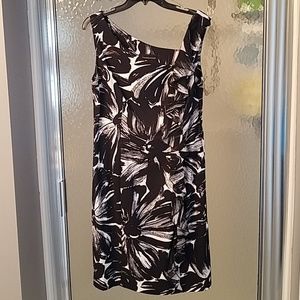 Knee length, asymmetrical neckline dress
